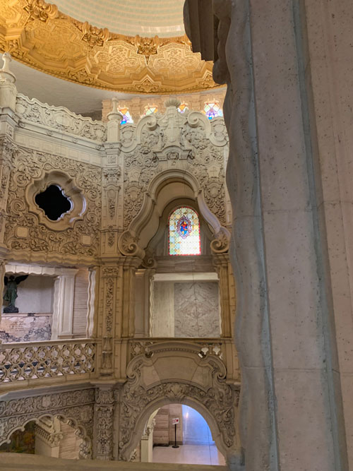 [View of the ornately decorated
interior of a tower inside the mausoleum, underneath a dome.]