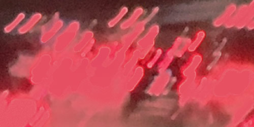 [Image of streaking lights on a highway.]